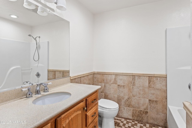 5252 US Highway 12, Yakima, WA 98908 - full bath featuring vanity, tile walls, a wainscoted wall, and bathtub / shower combination