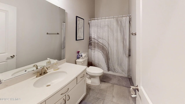 full bath featuring curtained shower, vanity, and toilet