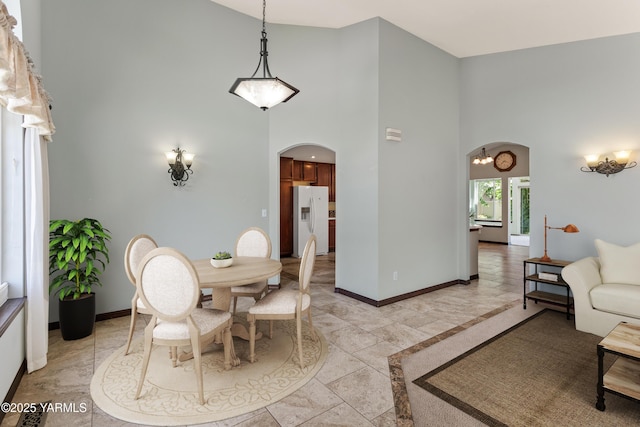 5304 Maui Pl, Yakima, WA 98908 - dining room with arched walkways and a high ceiling