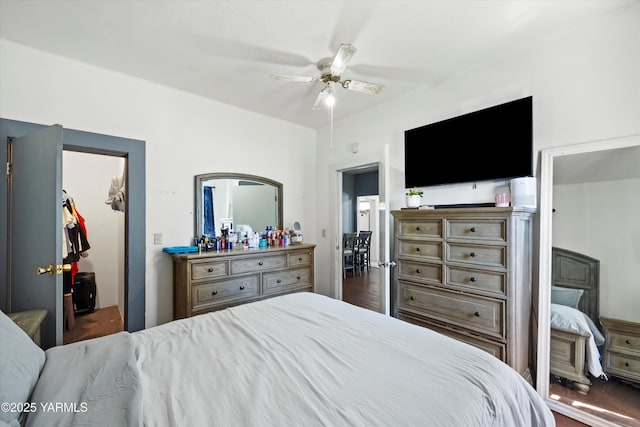 708 S 8th St, Yakima, WA 98901 - bedroom featuring a spacious closet, a closet, a ceiling fan, and wood finished floors