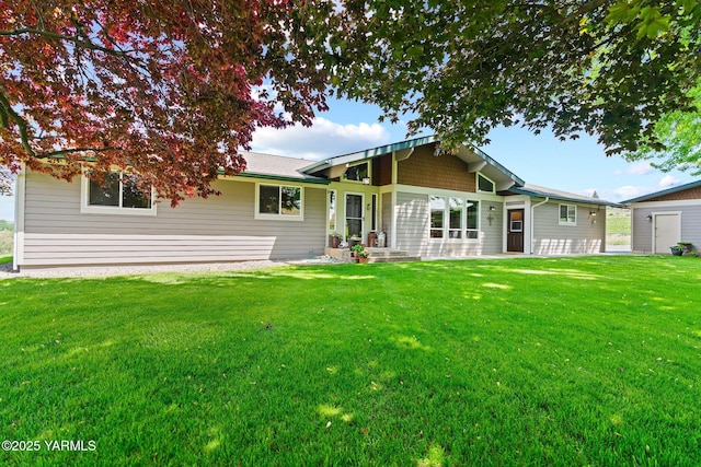 1312 Dazet Rd, Yakima, WA 98908 - rear view of property with a yard