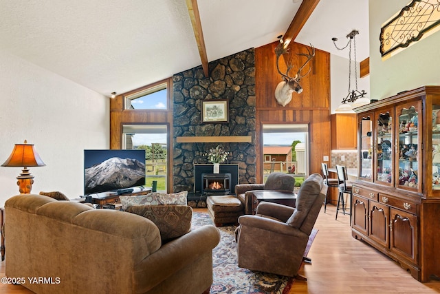 1312 Dazet Rd, Yakima, WA 98908 - living area with light wood finished floors, beamed ceiling, and high vaulted ceiling
