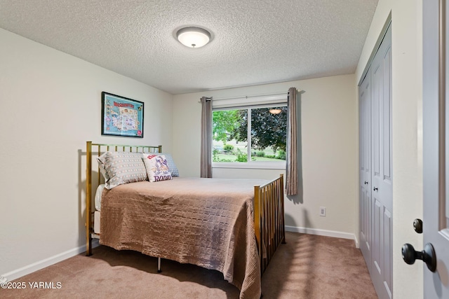 1312 Dazet Rd, Yakima, WA 98908 - carpeted bedroom with a closet, baseboards, and a textured ceiling