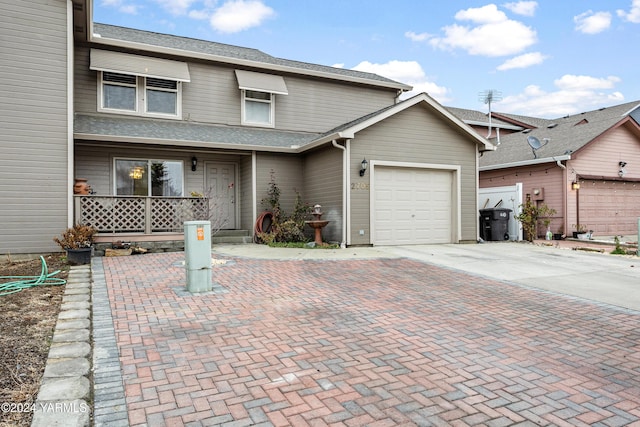 2705 Garrett St, Yakima, WA 98902 - view of property with decorative driveway and an attached garage