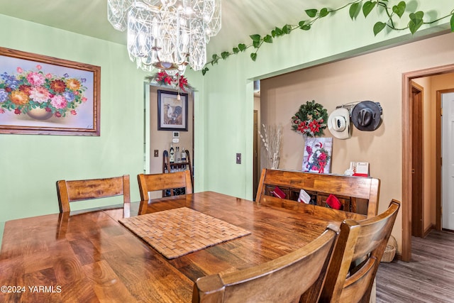 2705 Garrett St, Yakima, WA 98902 - dining space featuring a notable chandelier and wood finished floors