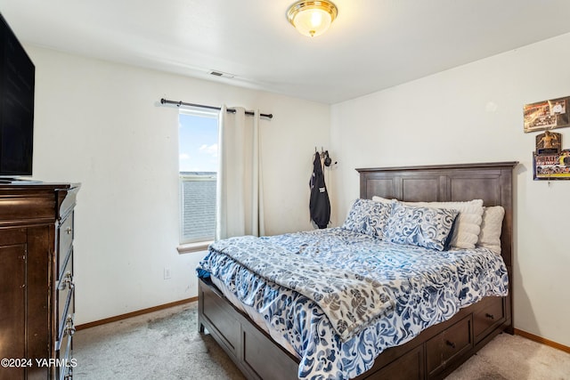 2705 Garrett St, Yakima, WA 98902 - bedroom with light carpet, baseboards, and visible vents