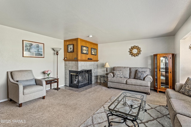 5502 Bristol Way, Yakima, WA 98908 - carpeted living room featuring a textured ceiling, baseboards, and a tile fireplace