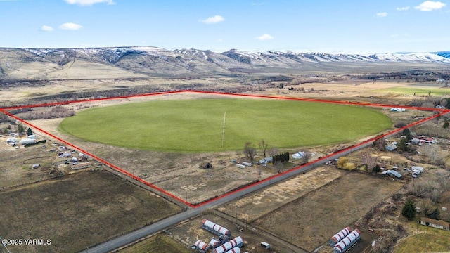 bird's eye view featuring a rural view and a mountain view