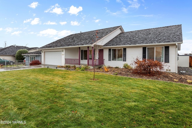 ranch-style house featuring a porch, concrete driveway, an attached garage, fence, and a front lawn