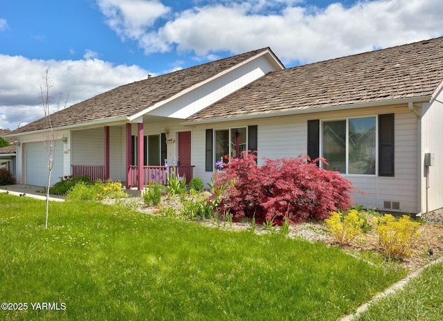 609 Jade Pl, Yakima, WA 98908 - ranch-style home with covered porch, a garage, and a front lawn