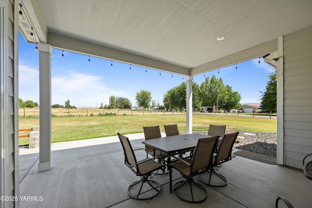 172004 NW Dogwood Rd, Prosser, WA 99350 - view of patio with outdoor dining area and a view of rural / pastoral area
