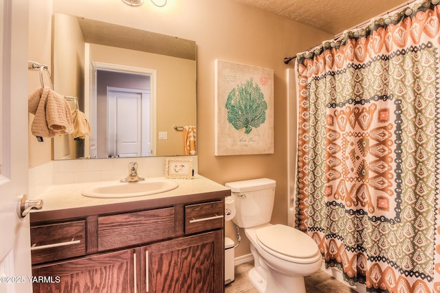 310 S 12th St, Selah, WA 98942 - bathroom with vanity, tasteful backsplash, a textured ceiling, and a shower with curtain