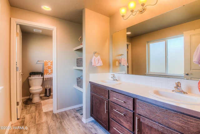 310 S 12th St, Selah, WA 98942 - bathroom with wood finished floors and double vanity