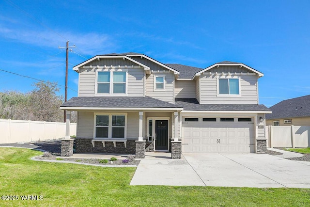 2400 S 63rd Ave, Yakima, WA 98903 - craftsman inspired home featuring a porch, roof with shingles, a garage, fence, and concrete driveway