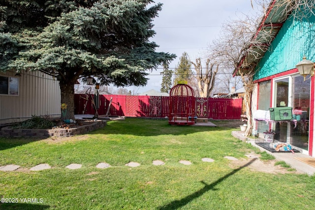 view of yard with a fenced backyard