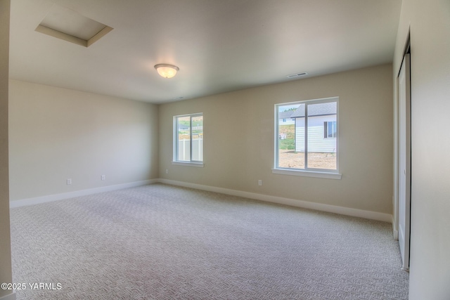302 N 90th Ave, Yakima, WA 98908 - spare room with carpet flooring and attic access