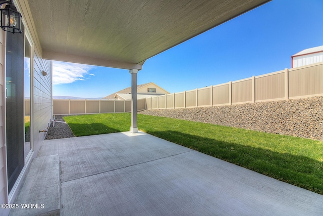 302 N 90th Ave, Yakima, WA 98908 - fenced backyard with a patio