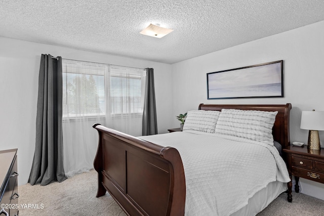 4704 W Prasch Ave, Yakima, WA 98908 - bedroom featuring a textured ceiling and light colored carpet