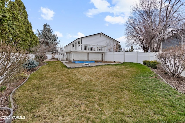 4704 W Prasch Ave, Yakima, WA 98908 - view of yard featuring stairs, a fenced backyard, a deck, a fenced in pool, and a patio area