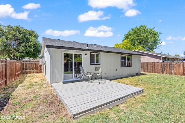 1805 S 66th Ave, Yakima, WA 98908 - rear view of property with a fenced backyard and a deck