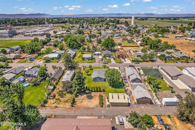 516 N Elm St, Toppenish, WA 98948 - aerial view of residential area featuring a mountainous background