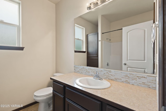 5901 Coolidge Rd, Yakima, WA 98903 - full bathroom featuring vanity, tasteful backsplash, and a shower