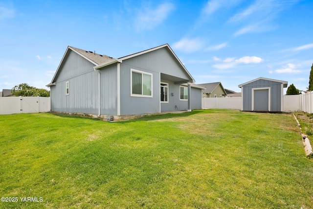5901 Coolidge Rd, Yakima, WA 98903 - rear view of house featuring a fenced backyard, a storage shed, and a gate