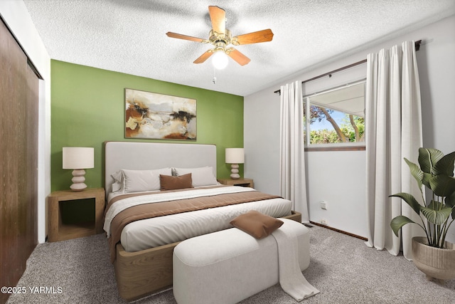 3204 Clinton Way, Yakima, WA 98902 - bedroom with carpet flooring, a textured ceiling, a ceiling fan, and a closet