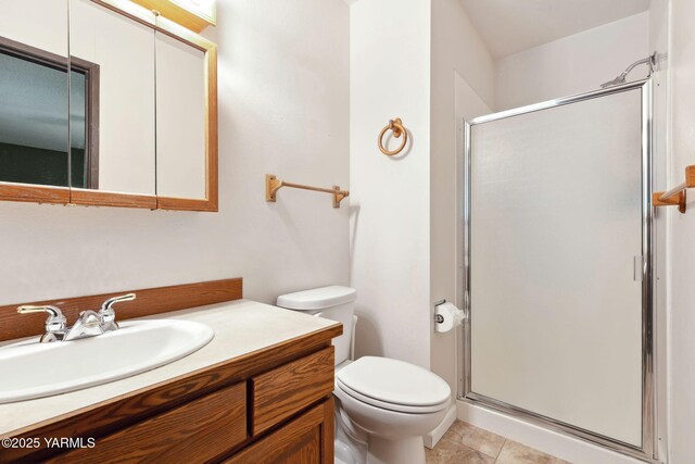 3204 Clinton Way, Yakima, WA 98902 - bathroom featuring a stall shower, vanity, and tile patterned floors