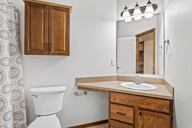 full bath featuring toilet and vanity