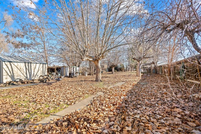 view of yard featuring fence