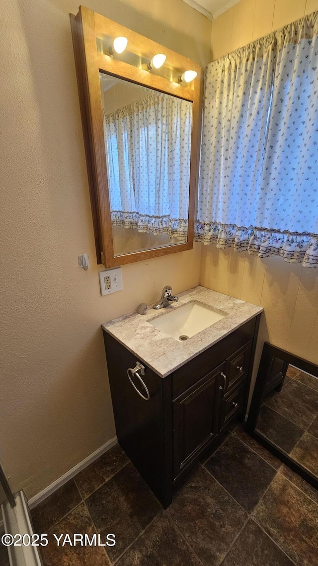 807 S 11th Ave, Yakima, WA 98908 - bathroom with vanity and stone tile flooring