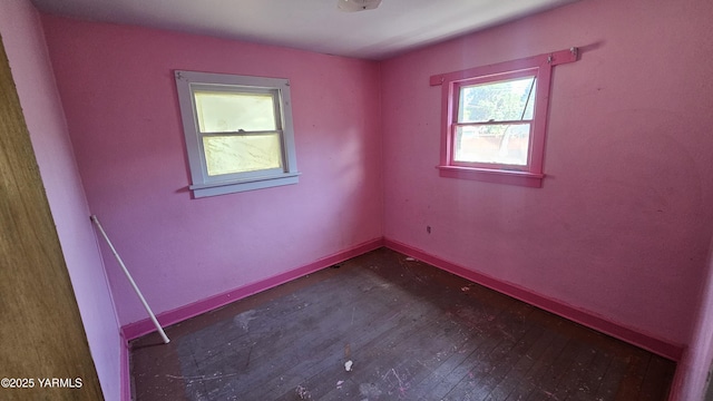 807 S 11th Ave, Yakima, WA 98908 - spare room with baseboards and wood-type flooring