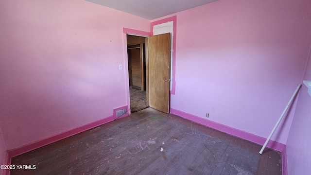 807 S 11th Ave, Yakima, WA 98908 - spare room featuring wood finished floors and baseboards