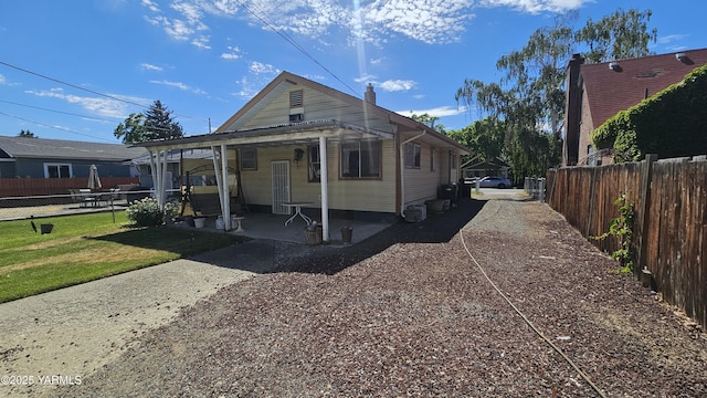 807 S 11th Ave, Yakima, WA 98908 - view of front of property featuring a fenced backyard and a patio area