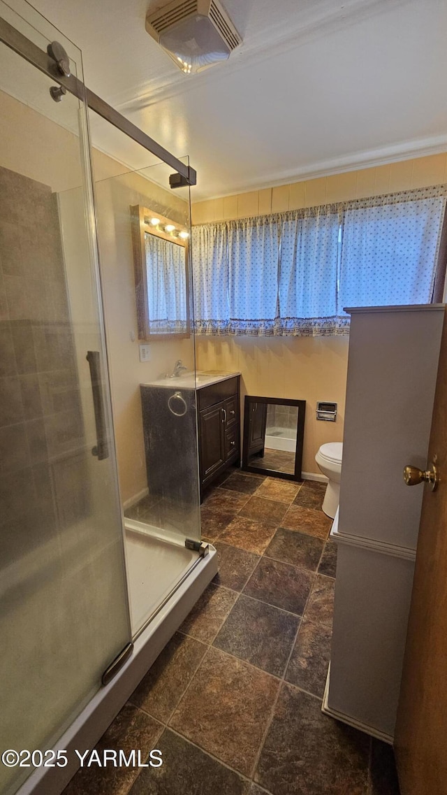 807 S 11th Ave, Yakima, WA 98908 - full bath with stone tile floors, a shower stall, and vanity