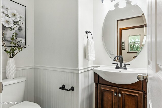 5807 W Whatcom Ave, Yakima, WA 98903 - half bathroom with a wainscoted wall and vanity
