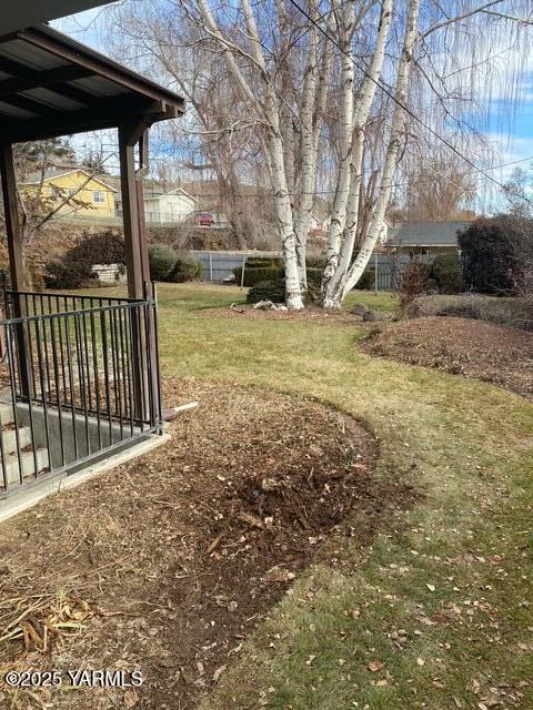 view of yard featuring fence