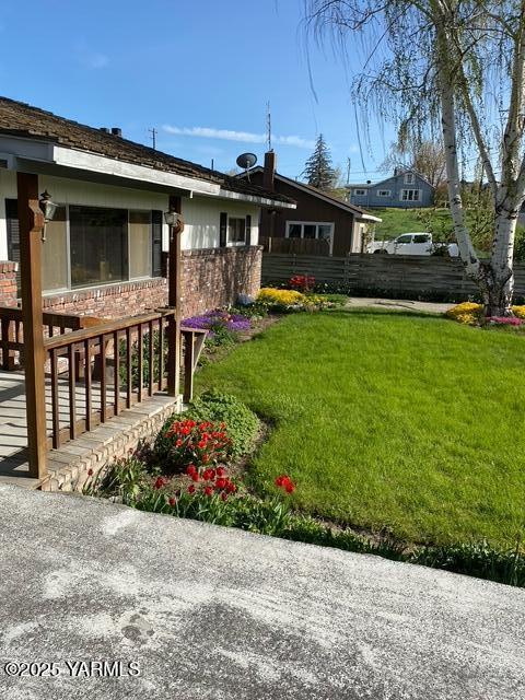 view of yard featuring fence