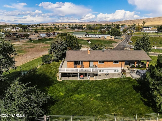 birds eye view of property featuring a mountain view and a rural view