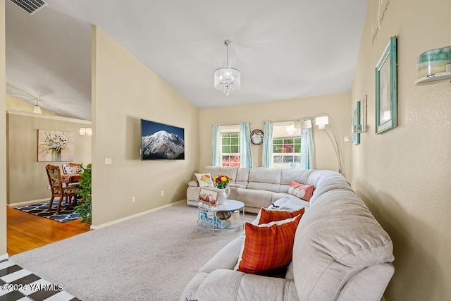 carpeted living area with lofted ceiling, an inviting chandelier, baseboards, and visible vents