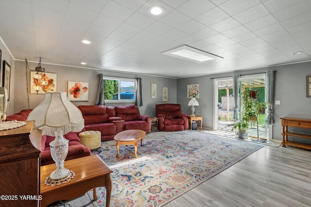 living area featuring recessed lighting and wood finished floors