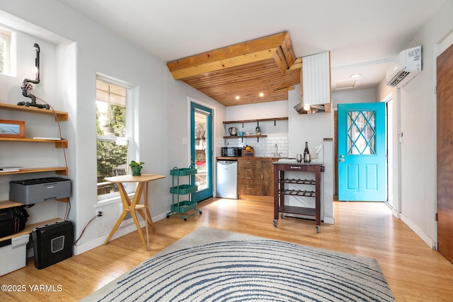 kitchen with beamed ceiling, light wood-style flooring, open shelves, and a wall mounted air conditioner