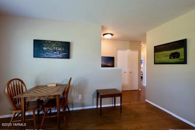 215 N 56th Ave Unit 42, Yakima, WA 98908 - dining area with wood finished floors and baseboards