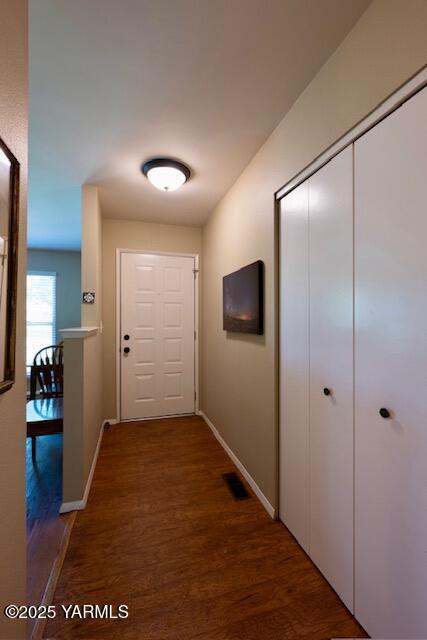 215 N 56th Ave Unit 42, Yakima, WA 98908 - corridor with wood finished floors and baseboards