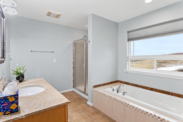 full bathroom featuring visible vents, tile patterned floors, a garden tub, vanity, and a shower stall