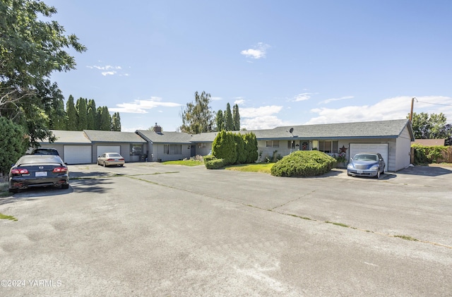 ranch-style house featuring an attached garage