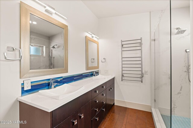 8 N 96th Ave, Yakima, WA 98908 - full bath with a marble finish shower, radiator, double vanity, and hardwood / wood-style flooring