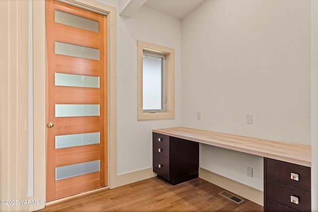 8 N 96th Ave, Yakima, WA 98908 - unfurnished office with wood finished floors and built in desk