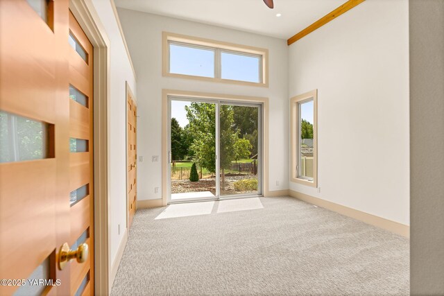 8 N 96th Ave, Yakima, WA 98908 - entryway featuring carpet flooring, a high ceiling, and ceiling fan